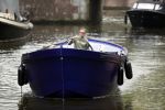 Amsterdam 13 mei 2017 
Prins Berenhard jr aan het varen in zijn waterdream sloep (boot) met zijn dochter Isabella en haar vriendinnen op de grachten van Amsterdam. Tijdens het varen regent het behoorlijk.