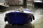 Amsterdam 13 mei 2017 
Prins Berenhard jr aan het varen in zijn waterdream sloep (boot) met zijn dochter Isabella en haar vriendinnen op de grachten van Amsterdam. Tijdens het varen regent het behoorlijk.