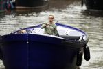 Amsterdam 13 mei 2017 
Prins Berenhard jr aan het varen in zijn waterdream sloep (boot) met zijn dochter Isabella en haar vriendinnen op de grachten van Amsterdam. Tijdens het varen regent het behoorlijk.