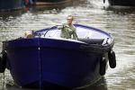 Amsterdam 13 mei 2017 
Prins Berenhard jr aan het varen in zijn waterdream sloep (boot) met zijn dochter Isabella en haar vriendinnen op de grachten van Amsterdam. Tijdens het varen regent het behoorlijk.