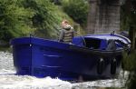 Amsterdam 13 mei 2017 
Prins Berenhard jr aan het varen in zijn waterdream sloep (boot) met zijn dochter Isabella en haar vriendinnen op de grachten van Amsterdam. Tijdens het varen regent het behoorlijk.