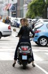 Amsterdam 12 mei 2017  
Stephanie Tency op vespa scooter