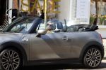 Amsterdam 18 april 2018
Bridget Maasland in haar mini cooper cabrio in Amsterdam zuid.