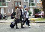 Amsterdam 18 april 2019
Boudewijn Poelman met zijn vrouw wandelend op straat  in Amsterdam zuid .