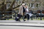 Amsterdam 18 april 2019
Boudewijn Poelman met zijn vrouw wandelend op straat  in Amsterdam zuid .