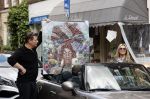 Amsterdam 30 april 2020
Bridget Maasland met haar mini cooper cabrio op weg met schilderij naar haar broer
