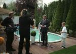 Eindhoven, 21 April 2000
Edwin Smulders gooit Willibrord Frequin in het zwembad
Junior Smulders kijkt toe en heeft lol
