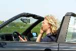 Den Haag16 mei 2002
Antonie Kamerling met gsm achter het stuur van zijn cabrio