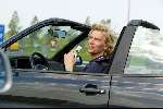 Den Haag16 mei 2002
Antonie Kamerling met gsm achter het stuur van zijn cabrio