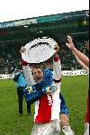 Nijmegen 5 Mei 2002 
NEC-AJAX Kampioenswedstrijd 0-2

Aanvoerder Cristian Chivu met de kampioensschaal
