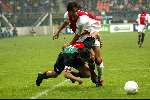 Nijmegen 5 Mei 2002 
NEC-AJAX Kampioenswedstrijd 0-2
Mido in duel met Danny Hesp