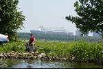 De Arena gezien vanaf De amstel
29 Mei 2003
Met een hengelaar