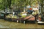 Woonboot aan grachten van Amsterdam
Sloepenroute