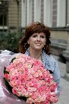 Amsterdam 13 mei 2004
Chazia Mourali met bos bloemen bij Amstel Hotel
