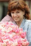 Amsterdam 13 mei 2004
Chazia Mourali met bos bloemen bij Amstel Hotel