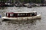 Amsterdam 30 mei 2004
Cindy Crawford in Amsterdam in boot