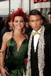 Rotterdam  10 mei 2004
Uitreiking Musical Awards in nieuw Luxor.
Kim Lian v d Weij met sexy jurk en vriend