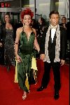 Rotterdam  10 mei 2004
Uitreiking Musical Awards in nieuw Luxor.
Kim Lian v d Weij met sexy jurk en vriend