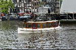 Amsterdam 2 mei 2004
Matt Damon met vriendin in rondvaartboot.