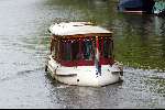 Amsterdam 2 mei 2004
Matt Damon met vriendin in rondvaartboot.