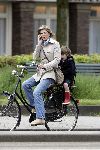 Amsterdam 11 mei 2005
Danielle Overgaag zonder krukken op fiets met Thijmen