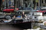Amsterdam 1 mei 2005
Jeroen Pauw met nieuwe vriendin varen met boot in grachten Amsterdam