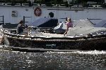 Amsterdam 14 mei 2005
Reinout Oerlemans en Danielle Overgaag varen met sloep.
Fiene en Thijmen zijn ook mee.