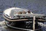 Amsterdam 14 mei 2005
Reinout Oerlemans en Danielle Overgaag varen met sloep.
Fiene en Thijmen zijn ook mee.