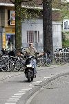 Amsterdam 10 mei 2005
Tygo Gernandt op scooter met kort haar en zonnebril