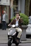 Amsterdam 2 mei 2005
Winston Gerschtanowitz op vespa scooter met gsm