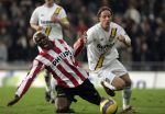 Eindhoven, 4 November 2006 Kompetitiewedstrijd PSV-NAC Eindstand 3-0 Seizoen 2006/2007
Arouna Kone wordt onderuit gehaald door Ronnie Stam