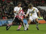 Eindhoven, 4 November 2006 Kompetitiewedstrijd PSV-NAC Eindstand 3-0 Seizoen 2006/2007
Jefferson Farfan in duel met Patrick Zwaanswijk