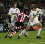 Eindhoven, 4 November 2006 Kompetitiewedstrijd PSV-NAC Eindstand 3-0 Seizoen 2006/2007
Jefferson Farfan in duel met Patrick Zwaanswijk