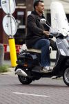 Amsterdam 30 oktober 2006
Ruud Gullit op vespa scooter.