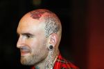 Rotterdam 2 oktober 2011
Uitreiking edisons in het world trade center in Rotterdam. Ben Saunders met zijn vriendin Soraya met de tatoo's op hun lichaam
Peter Smulders bv