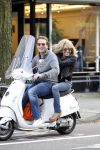 Amsterdam 4 oktober 2011
Patricia Paay en vriend Nicky v Dam op vespa scooter.
Peter Smulders bv