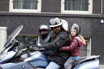 Amsterdam 29 oktober 2011
Reinout Oerlemans met baard en dochter Fiene op de motor.
Peter Smulders bv