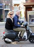 Amsterdam 1 november 2014
Caroline Tensen met haar man Ernst Jan Smids op hun vespa scooter.