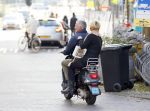 Amsterdam 1 november 2014
Caroline Tensen met haar man Ernst Jan Smids op hun vespa scooter.