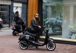 Amsterdam 13 september 2015
Olcay Gulsen met haar verloofde Frans op de pc hooftstraat op scooters