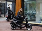 Amsterdam 13 september 2015
Olcay Gulsen met haar verloofde Frans op de pc hooftstraat op scooters