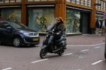 Amsterdam 13 september 2015
Olcay Gulsen met haar verloofde Frans op de pc hooftstraat op scooters