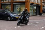 Amsterdam 13 september 2015
Olcay Gulsen met haar verloofde Frans op de pc hooftstraat op scooters