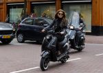 Amsterdam 13 september 2015
Olcay Gulsen met haar verloofde Frans op de pc hooftstraat op scooters