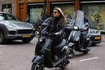 Amsterdam 13 september 2015
Olcay Gulsen met haar verloofde Frans op de pc hooftstraat op scooters