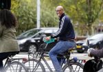Amsterdam 8 oktober 2016 
Jimmy Geduld met zijn dochter op de fiets