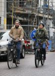 Amsterdam 13 februari 2016
Bridget Maaland met haar nieuwe vriend Wim ( cameraman) op de fiets in Amsterdam zuid.