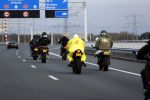 Muiden  31 oktober 2020
Motorrijder in Geel regenpak