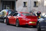 Amsterdam 26 oktober 2022
Bram Moszkowicz in zijn rode porsche 911 in Amsterdam centrum.