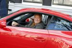 Amsterdam 26 oktober 2022
Bram Moszkowicz in zijn rode porsche 911 in Amsterdam centrum.